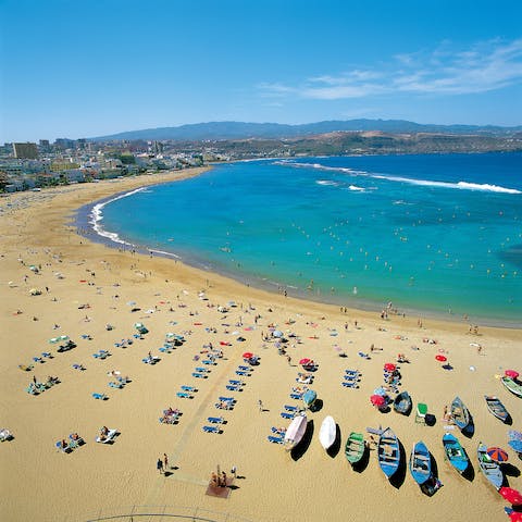 Sprawl out on the sands of Las Canteras Beach and soak up the sun – it's a two-minute walk away