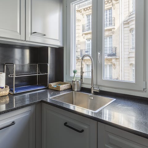 Cook up French favourites in the kitchenette with views of gorgeous Haussmann architecture 