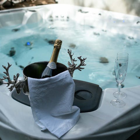 Luxuriate in the private Jacuzzi with a glass of bubbly and unwind