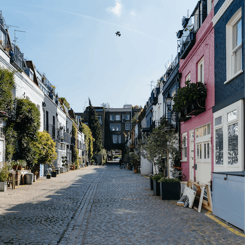 Explore Notting Hill's colourful streets and lively market