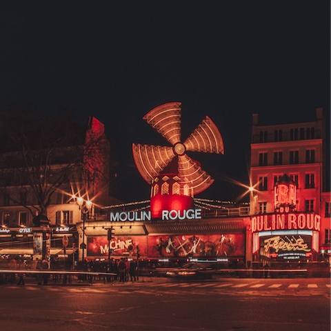 Have dinner and catch a show at the iconic Moulin Rouge, just around the corner