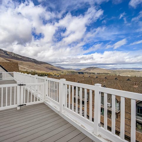 Enjoy the epic views from your balcony with a hot cup of cocoa
