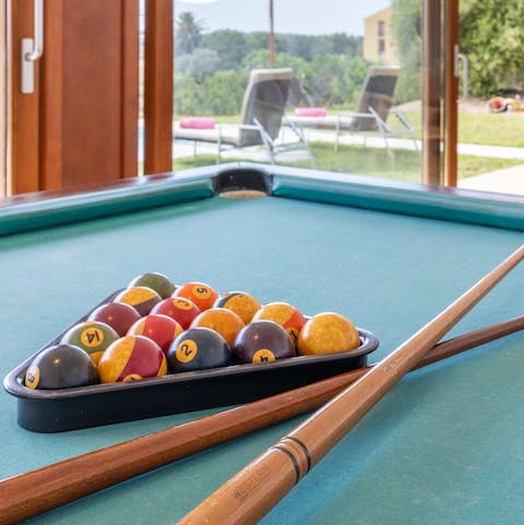 Enjoy a few friendly rounds of pool in the games room