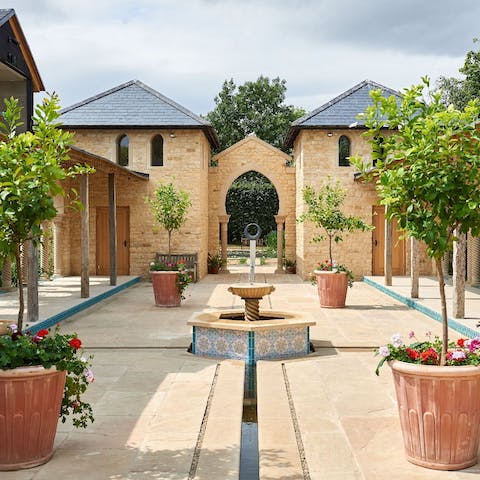 Take a turn around the Moorish-inspired shared gardens