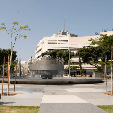 Admire the  Fire and Water Fountain at Dizengoff Square