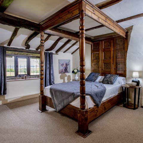 Get a great night's sleep in your elegant four-poster bed