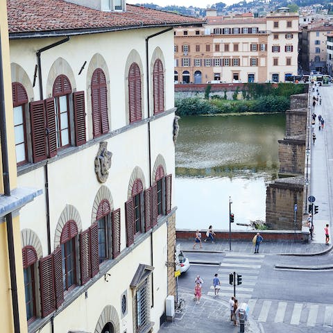 Look out over the River Arno from your third-floor vantage point