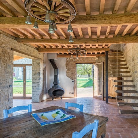 Open the doors and feel the warm Tuscan breeze flow through this traditional home
