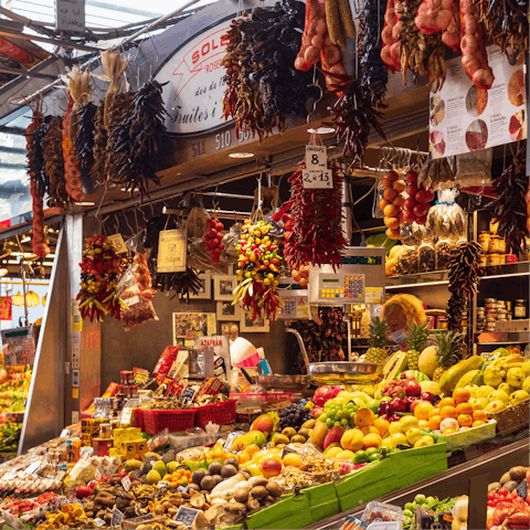 Pick up supplies from nearby Mercado de Alvalade