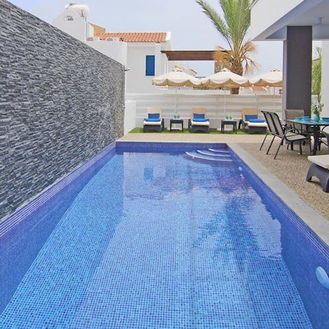 Jump into the private pool for a refreshing afternoon dip