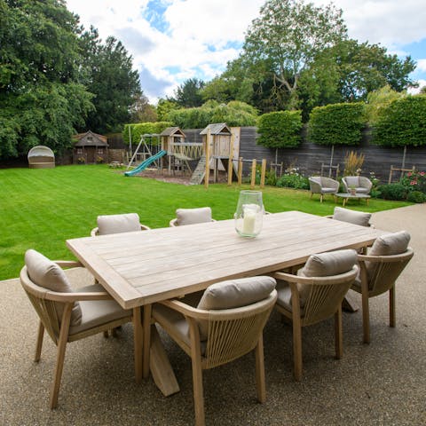 Come together in the garden for a family barbecue in the sun