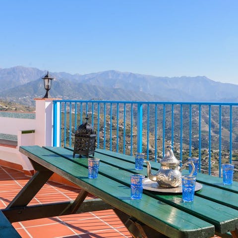 Enjot tea together on the terrace, overlooking the sprawling mountain vistas