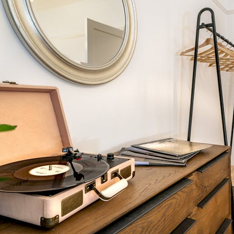 Get yourself in the mood for a night out with the vintage record player
