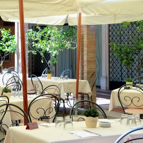 Dine like a local in your building's courtyard restaurant