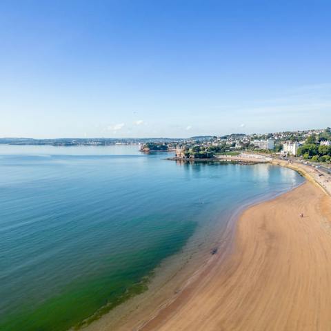 Start the day with an invigorating stroll along Torquay Beach, footsteps from your building