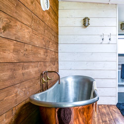 Soak in the copper tub after a day of hiking
