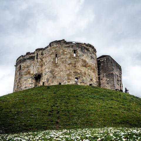 Hop over the river to Clifford's Tower, just a nine-minute walk from your door