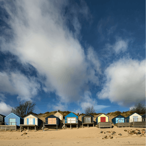Drive over to Abersoch Beach and its colourful beach huts in under five minutes