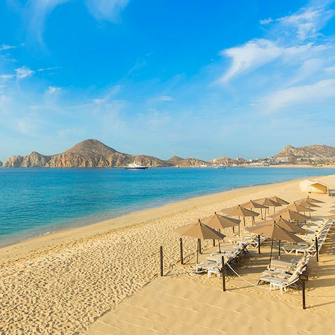 Spend the day at Cabo San Luca's pristine beach, a two-minute walk away