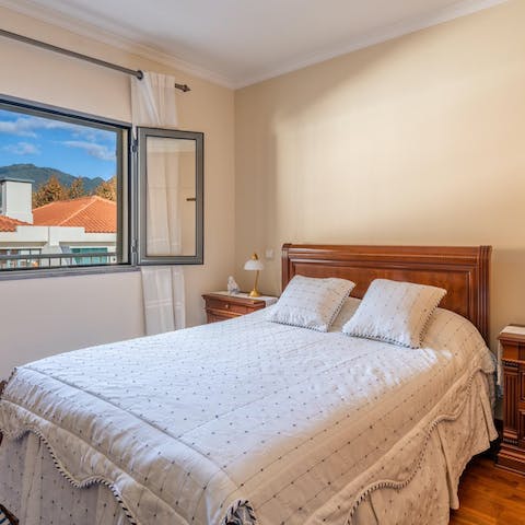 Wake up well-rested and take in the mountain view outside your window