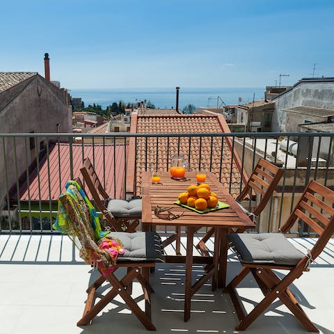 Make the most of the sunshine and sea views from the terrace of this central Taormina home