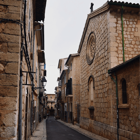 Explore the shaded alleyways of Port de Pollença