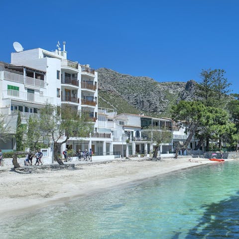 Go for a sunny stroll along Platja d'Albercutx