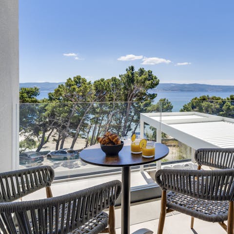 Start your days with a morning coffee on the balcony, looking out to the sea