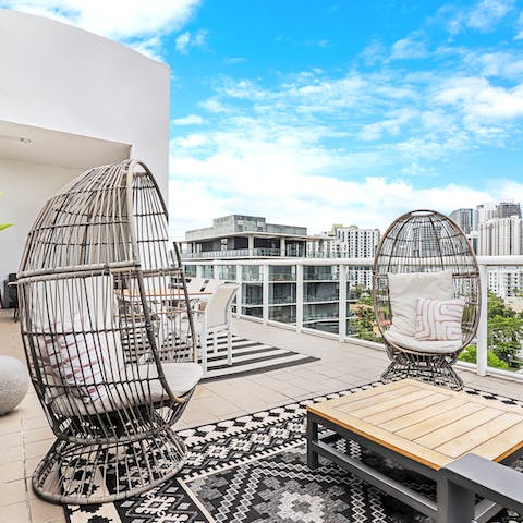 Take in the view from the beautifully designed communal roof terrace