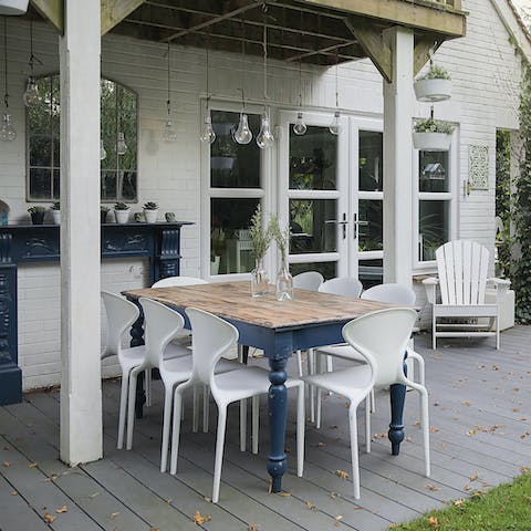 Dine alfresco at the sheltered outdoor dining area 