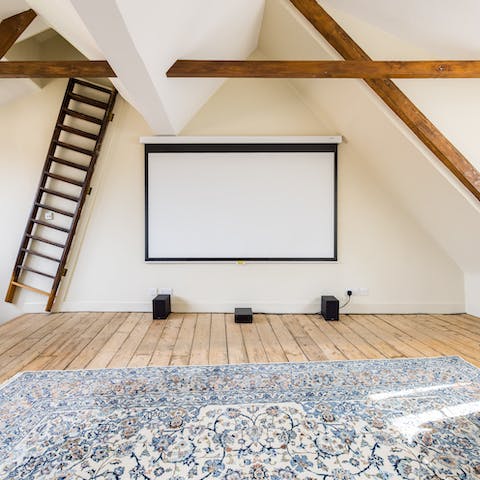 Settle in for a movie night in the attic cinema room