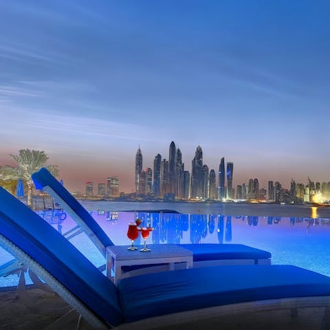 Sip a cocktail at the outdoor pool as you soak up the skyline