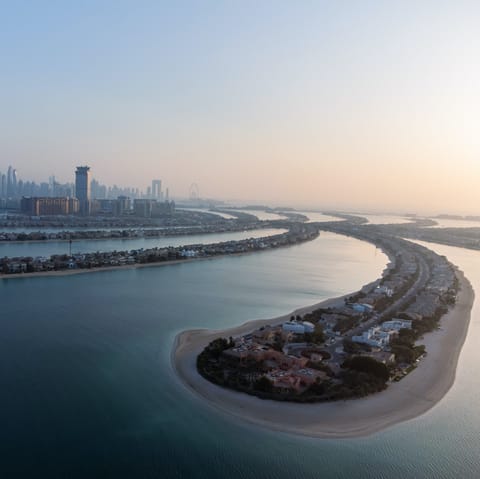 Stay on the famous Palm Jumeirah, a manmade luxury palm shaped island