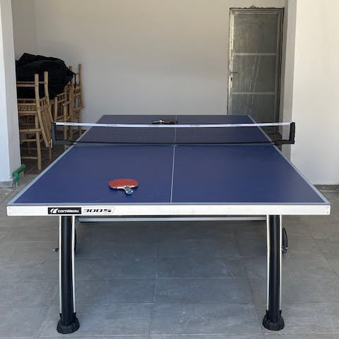 Challenge the group to a ping-pong tournament