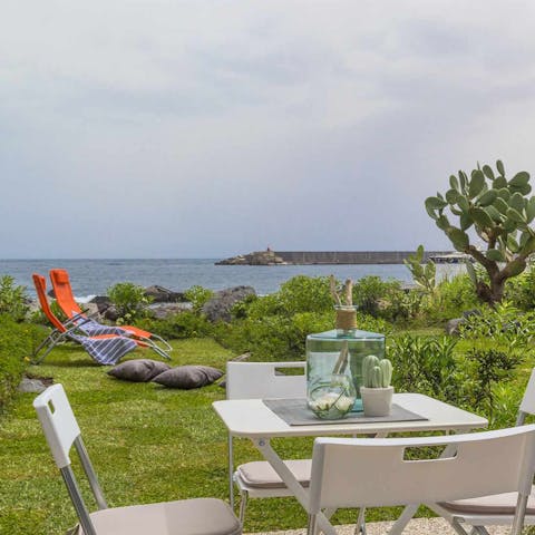 Enjoy alfresco meals in the garden, which has direct access to the sea 