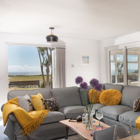 Listen to the waves lapping into the shore amidst the comfy ambience of the living area