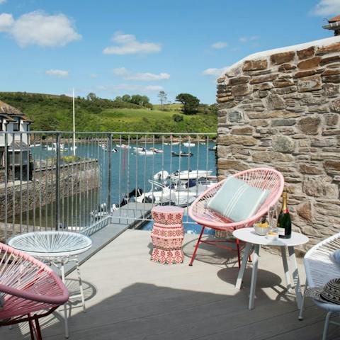 Watch a sunset over Salcombe's harbour from the waterside terrace