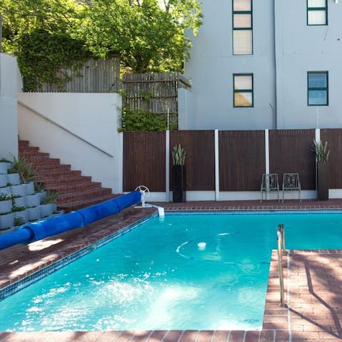 Cool down with a dip in the building's shared outdoor pool
