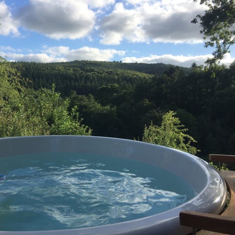 Rent out the wood fired hot tub and take in far-reaching woodland views