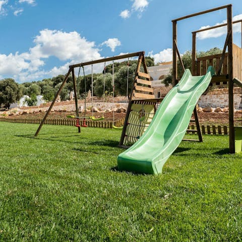 Let little ones roam free in the grassy playground