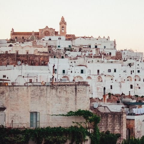 Wander the streets of Ostuni's picturesque old town, a short drive from home