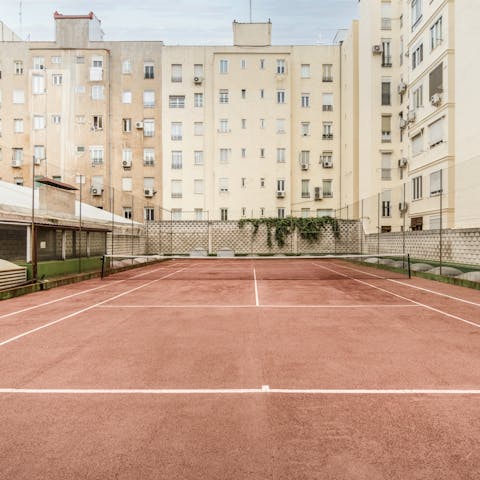 Enjoy a game of tennis on the on-site court