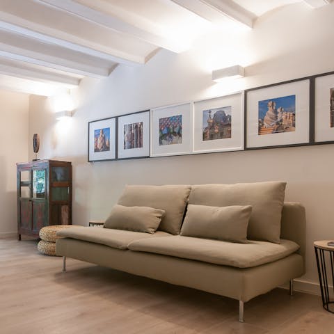 Kick back in the open-plan living area with a glass of Spanish wine after a day of touring the city