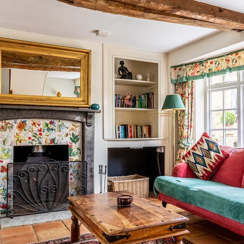 Take turns stoking the fire in your cosy country-style living room