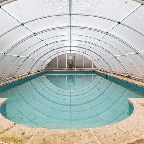 Splash about in the swimming pool whatever the weather