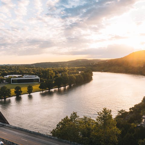 Take a stroll along Lady Bird Lake at sunset, a twenty-minute drive away