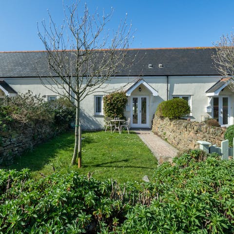 Enjoy a cream tea in the suntrap garden