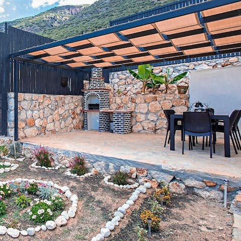 Cook Turkish feasts on the outdoor barbecue, then dine alfresco beneath the pergola 