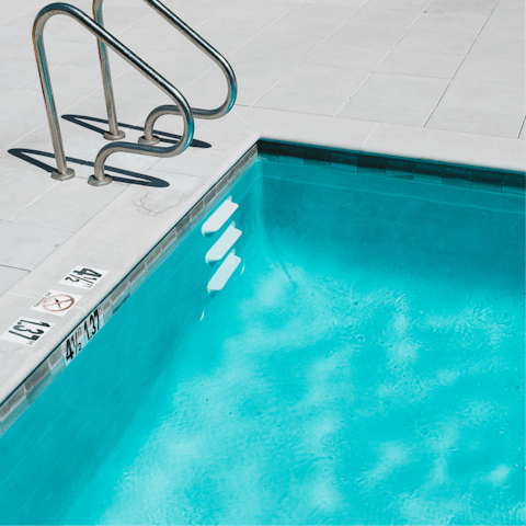 Enjoy a refreshing dip in the shared swimming pool