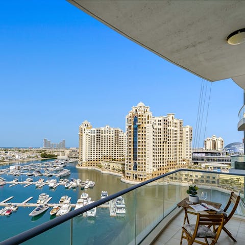 Sit out on the balcony and admire the dreamy views of the marina below